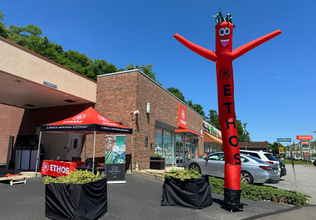 an inflatable tube man as a physical advertisement