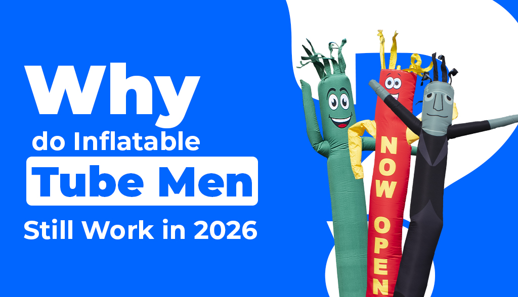 Inflatable tube man outside a storefront attracting attention from passing traffic.