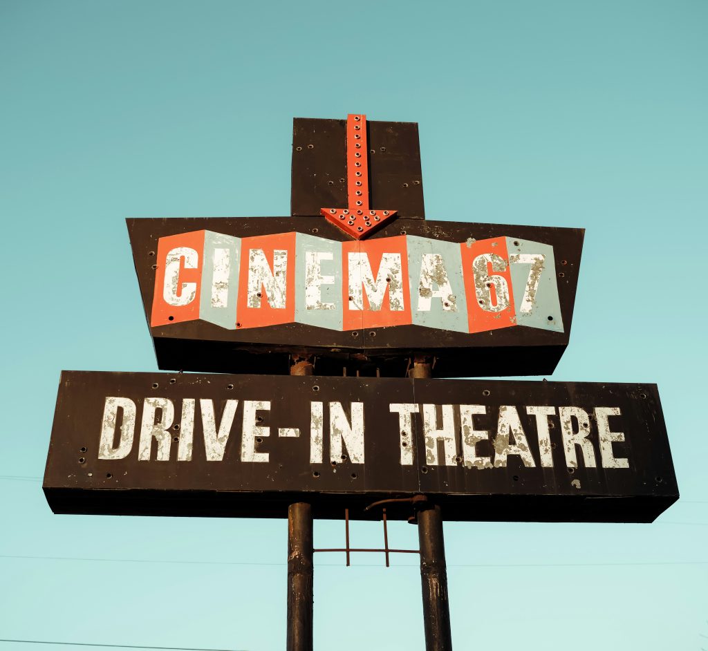 an old drive-in-theater sign