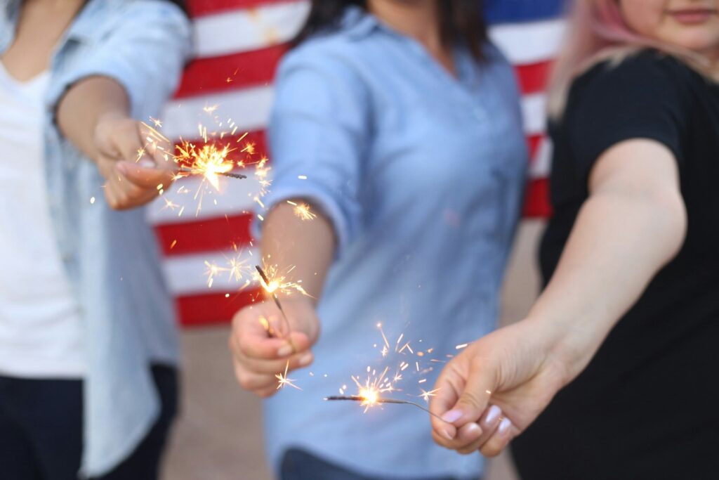 People holding sparklers