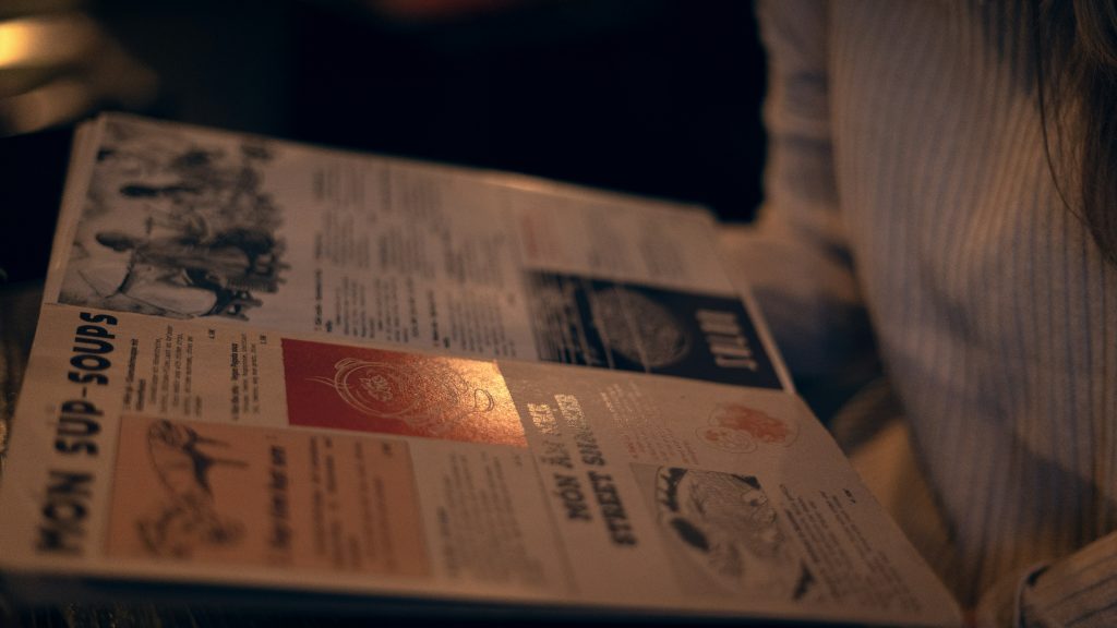 Person reading food menu