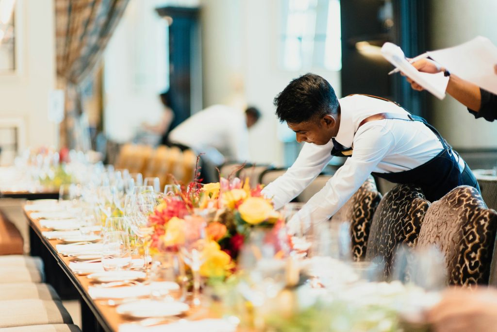 Waiter setting large table