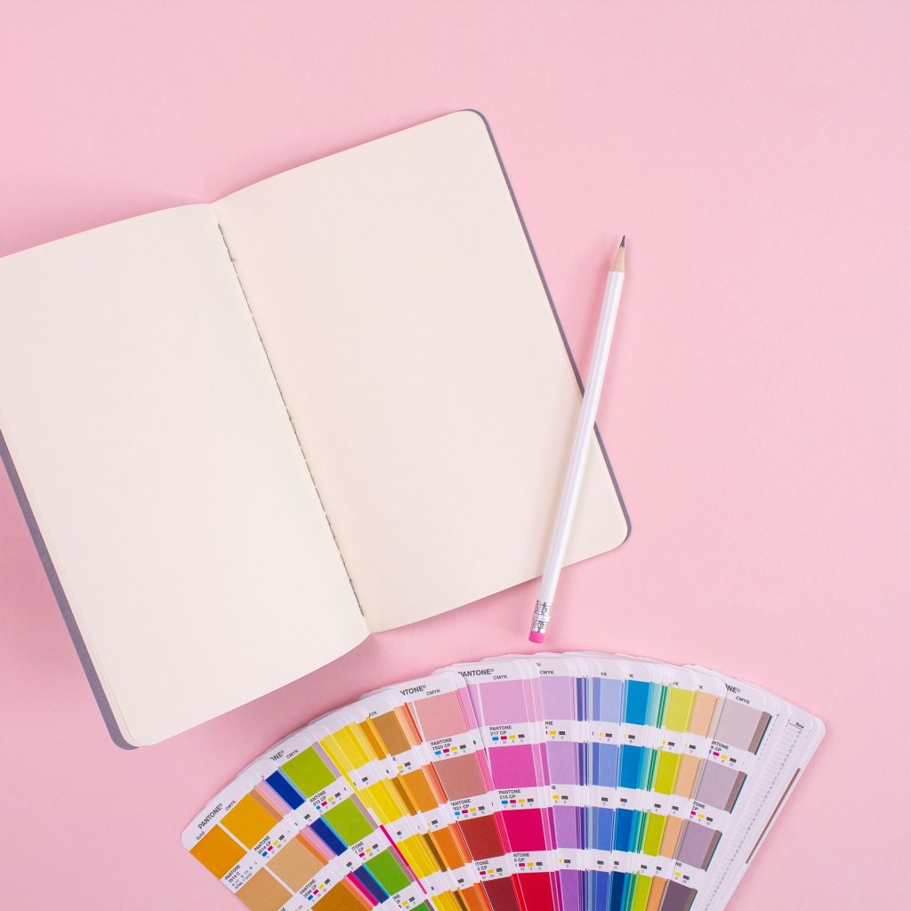 white notebook with color swatches