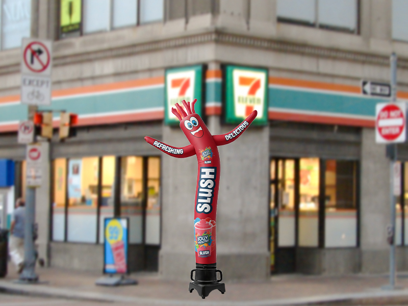 Custom inflatable tube man standing approximately 8ft tall on blower for storefront advertising and sidewalk display