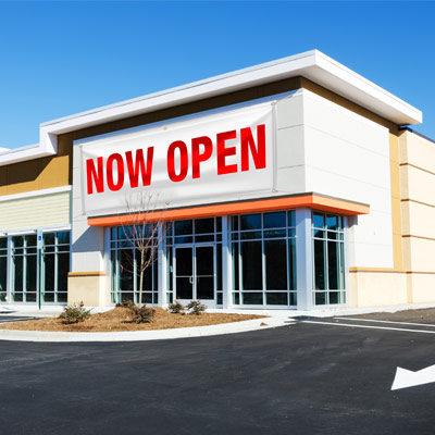 A white banner with red lettering